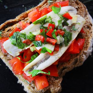 Marinated Fresh Cured Anchovies on bread