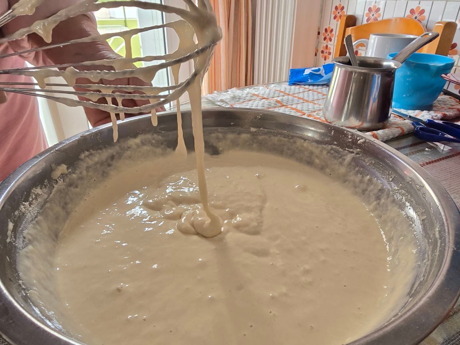 Strings of dough for Greek donuts (loukoumades).